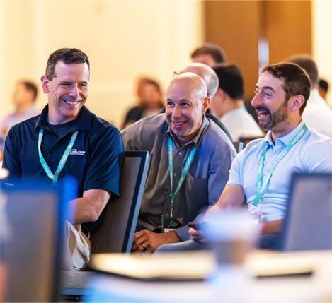 Image of people in a conference.